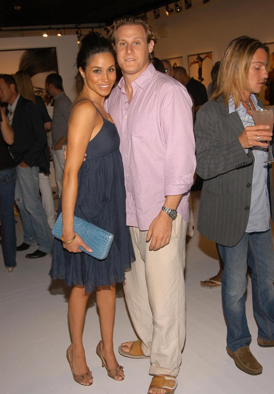 Меган Маркл и Тревор Энджелсон стали гостями фотовыставки COACH Legacy Рида Кракоффа.