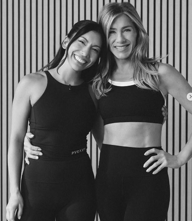 Энистон (справа) с тренером Коулманом (слева) в октябре.