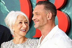 Tom Hardy shared a warm embrace with his MobLand co-star Dame Helen Mirren at the season two premiere on Thursday, but a body language expert has claimed there was more to the hug than meets the eye