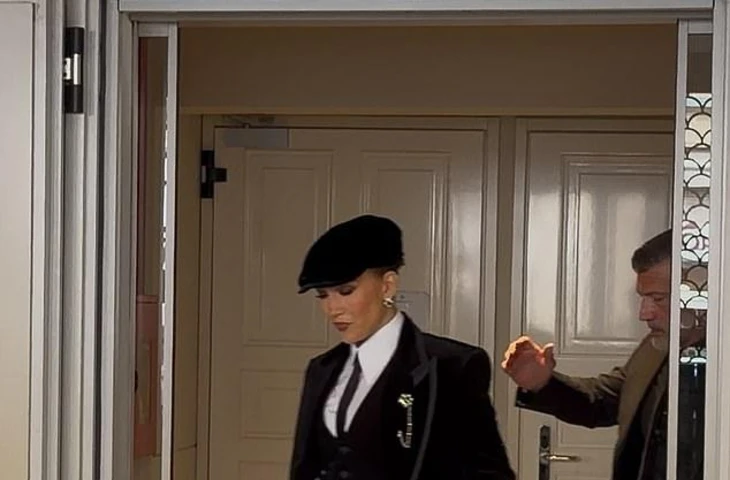 Jennifer Lopez channels Peaky Blinders as she sports baker boy hat and suit for Dolce & Gabbana’s Milan Fashion Week show